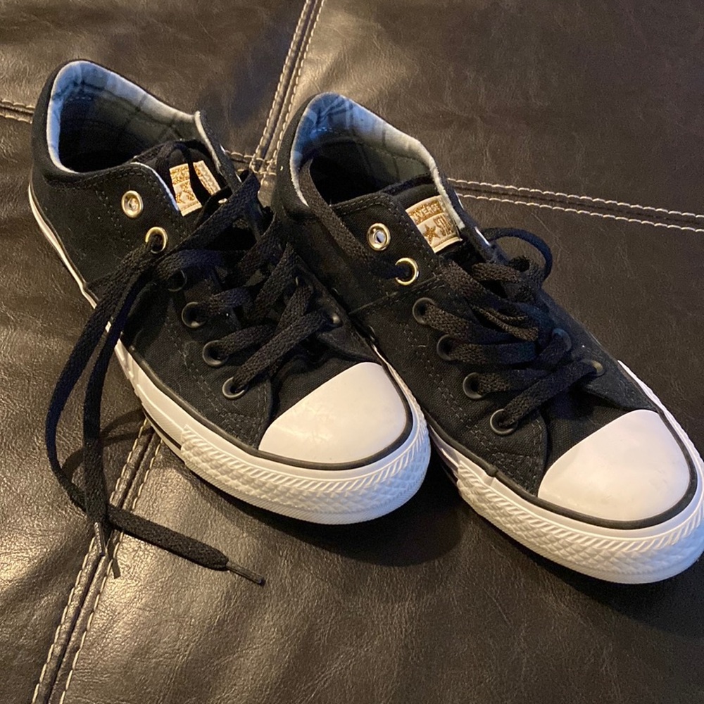Converse black Chuck Taylor.
